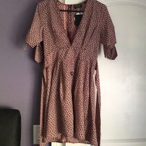 Mini dress with floral detail pattern